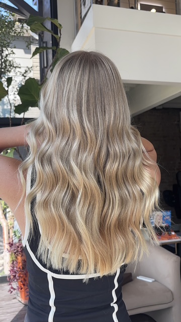 Blended blonde balayage, back view, by Evelyn