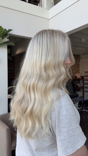 Bright platinum blonde with waves by Evelyn