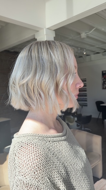 Icy blonde textured bob by Evelyn