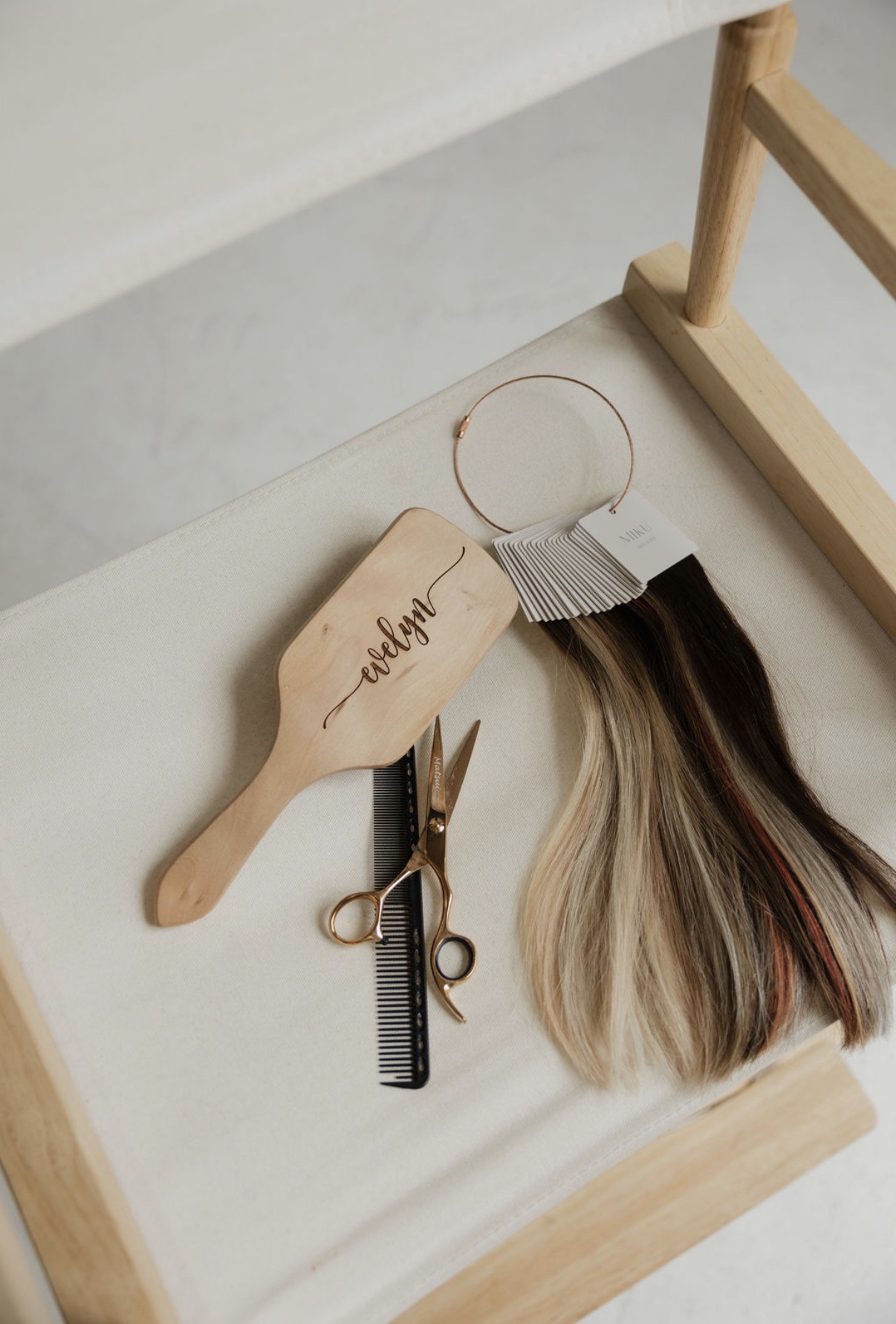 Evelyn's engraved brush, shears, and color swatches